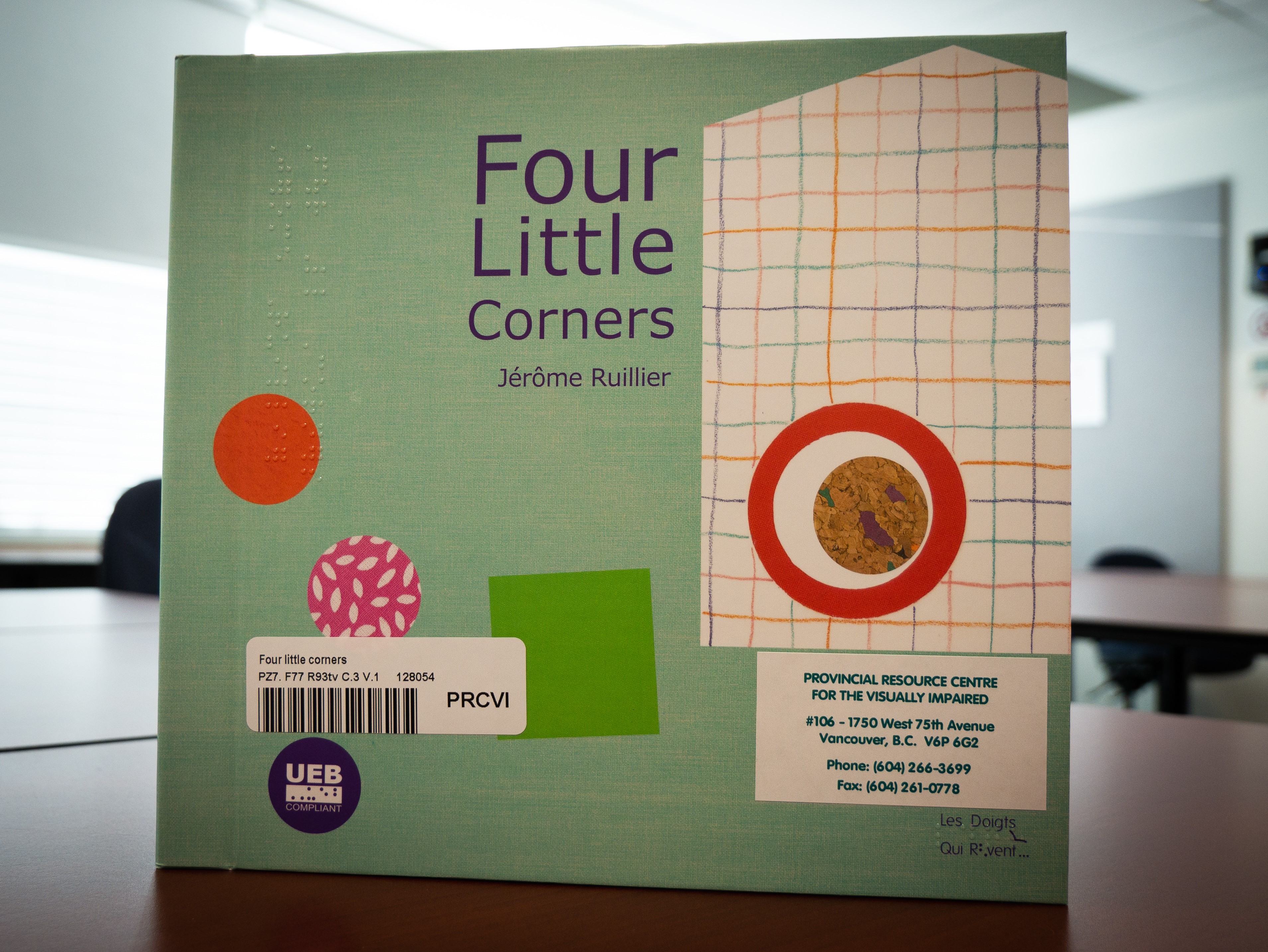 A close up of the cover of Four Little Corners